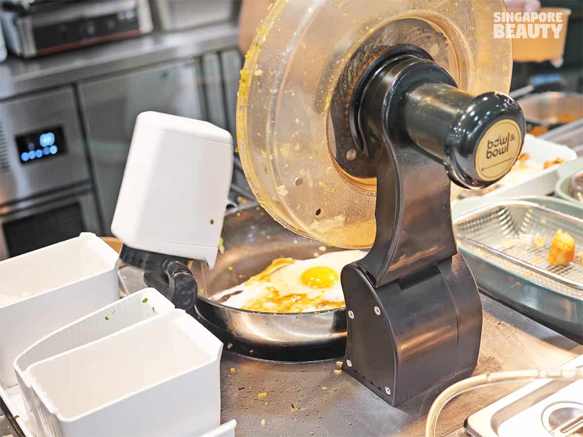 bowl and bowl food train on track tossing egg