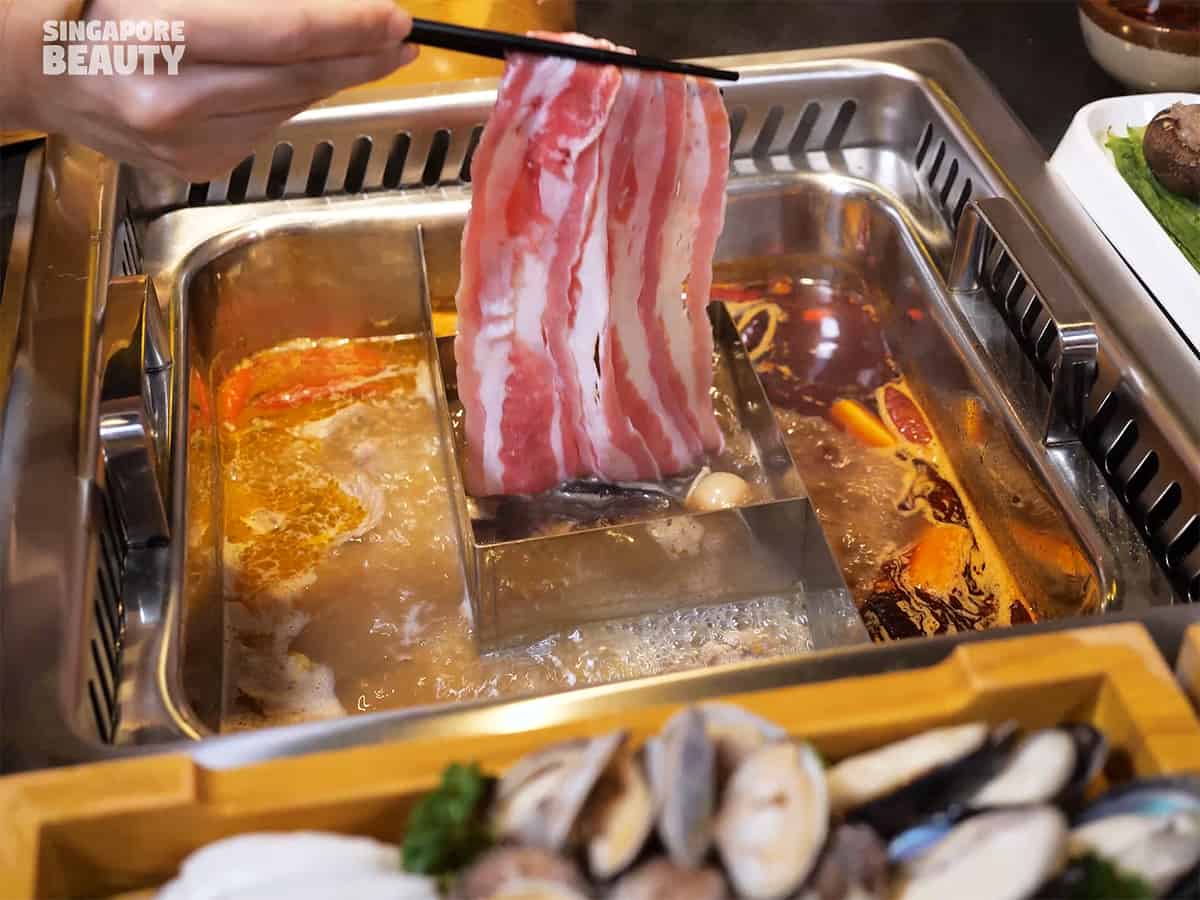 https://singaporebeauty.com/wp-content/uploads/2021/10/Yun-nan-ahms-hotpot-buffet-mala.jpg